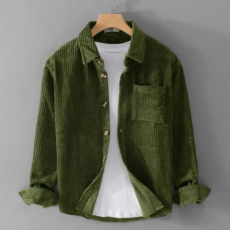 Soft textured green corduroy button-up shirt with a relaxed fit and single chest pocket, perfect for layering or solo wear.