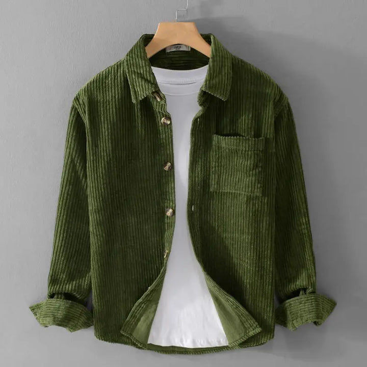 Soft textured green corduroy button-up shirt with a relaxed fit and single chest pocket, perfect for layering or solo wear.