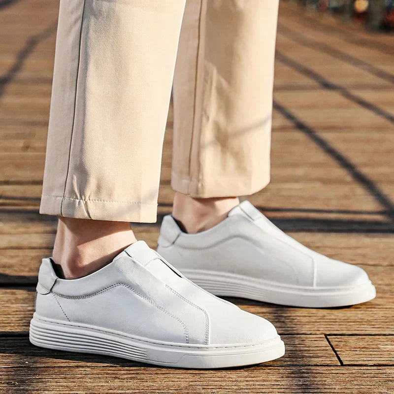 Alvio genuine leather slip-on shoes in white, featuring cushioned footbed and structured design for daily comfort.