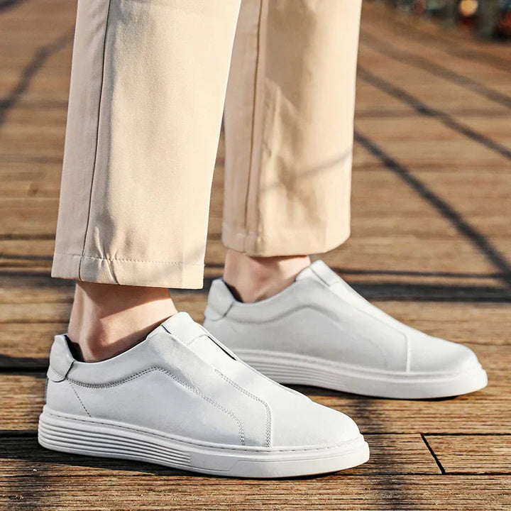 Alvio genuine leather slip-on shoes in white, featuring cushioned footbed and structured design for daily comfort.