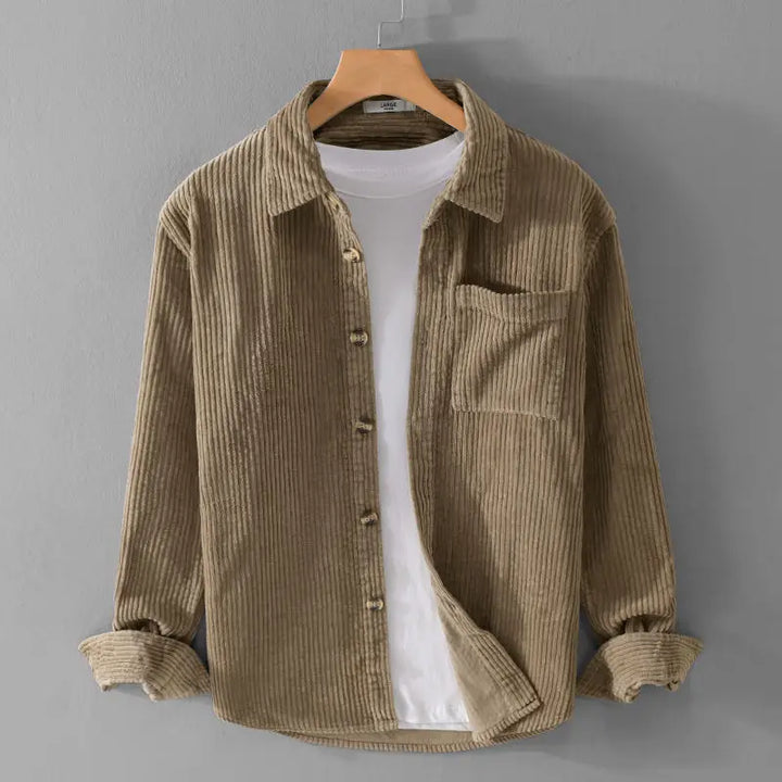 Soft corduroy button-up shirt in tan with single chest pocket and relaxed fit, perfect for layering or solo wear.