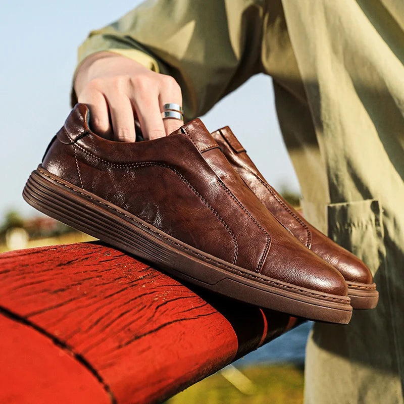Alvio genuine leather slip-on shoes, featuring a smooth brown exterior and cushioned insole for all-day comfort.