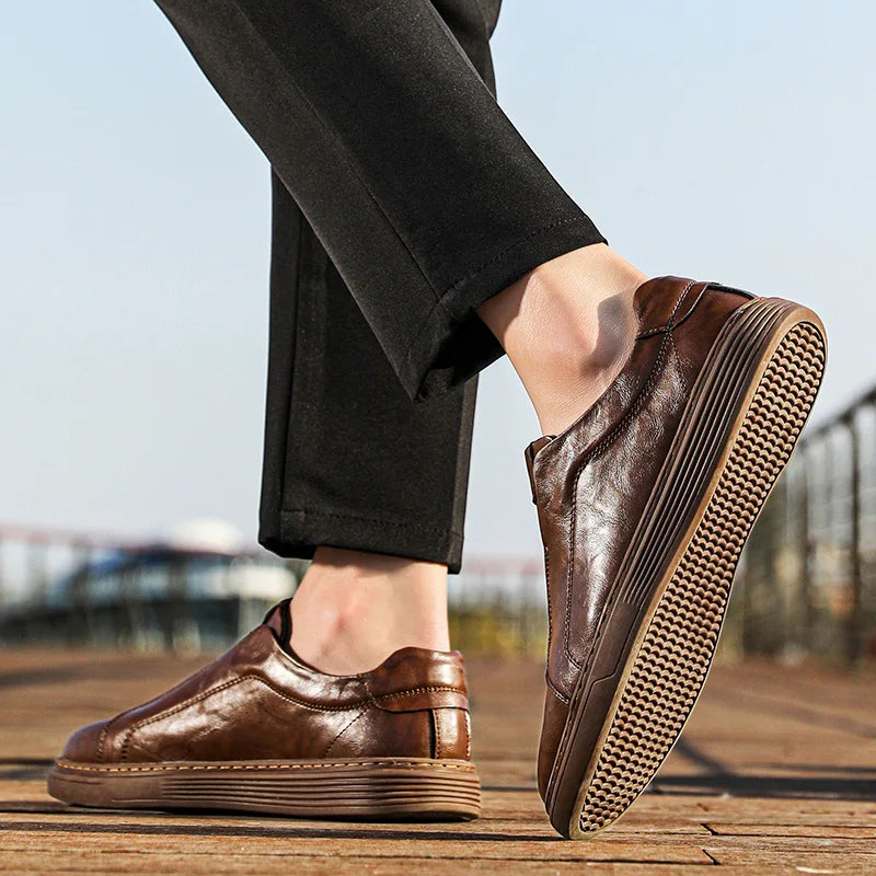 Alvio Genuine Leather Shoes: Smooth brown slip-on shoes with cushioned footbed for comfort and support, ideal for daily wear.