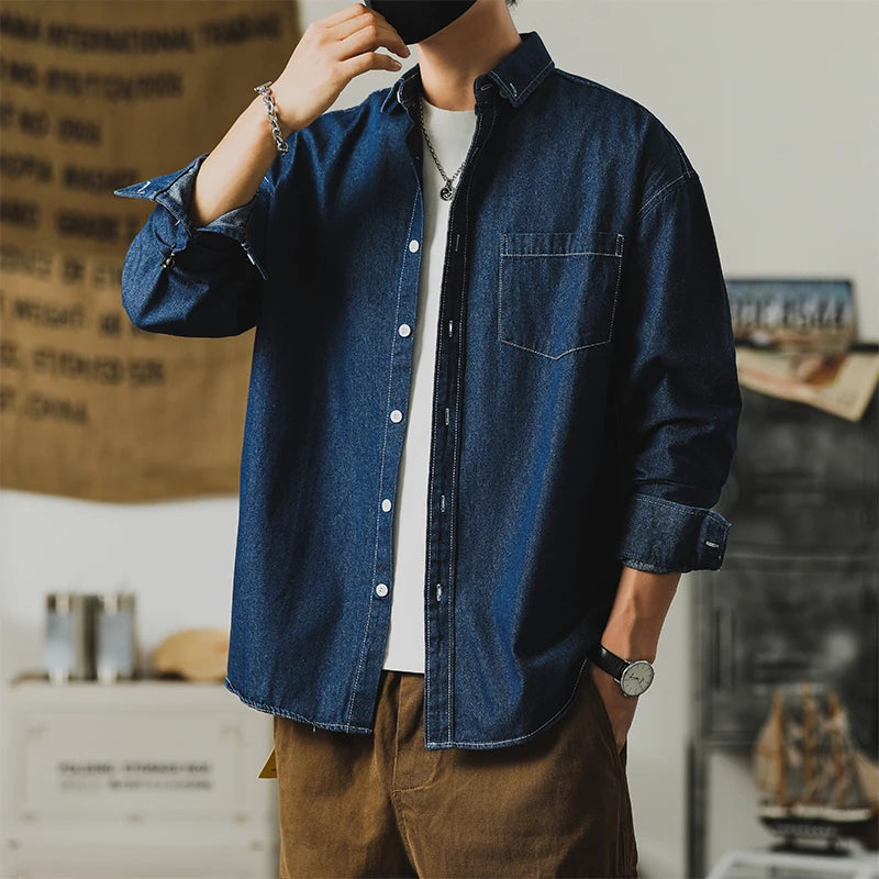 Frontier denim jacket showcasing ultra-durable fabric with a minimalist design and subtle distressing, perfect for every day.