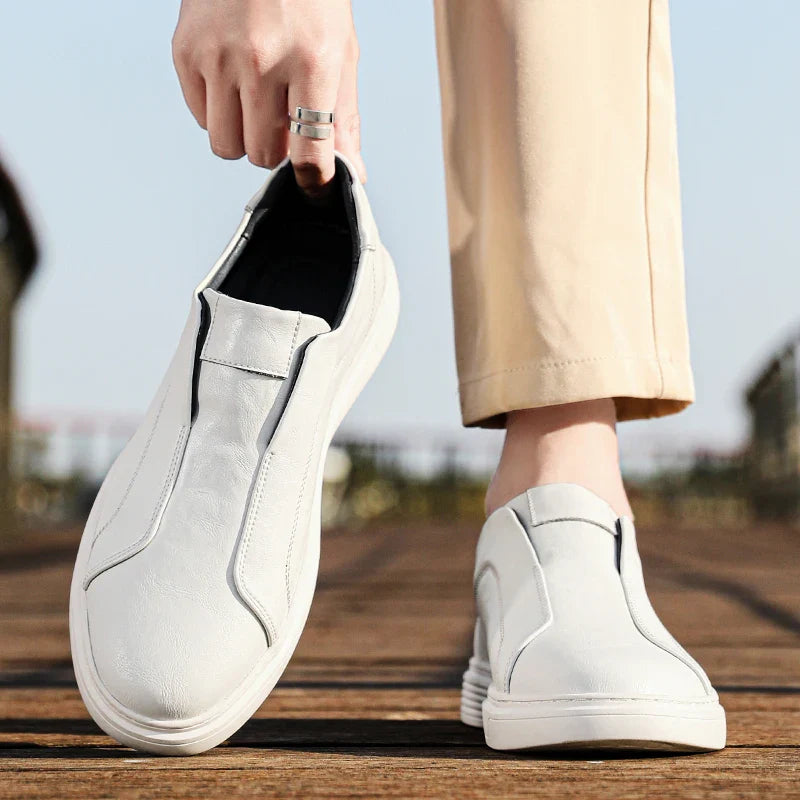Person wearing Alvio genuine leather slip-on shoes, demonstrating comfort and stylish design for daily wear.