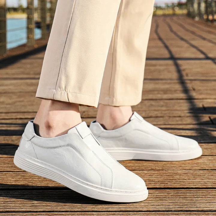 Alvio genuine leather shoes in white, slip-on design, perfect for daily wear and effortless style.