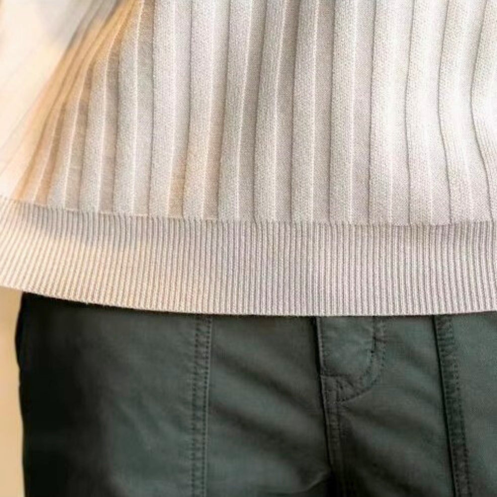 Close-up of ribbed texture and hem of Jay Flex-Fit Shirt, showcasing its athletic fit and stylish design.