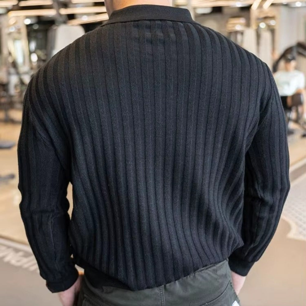 Back view of a muscular man wearing a ribbed Jay Flex-Fit Shirt in black, showcasing its athletic fit and texture.