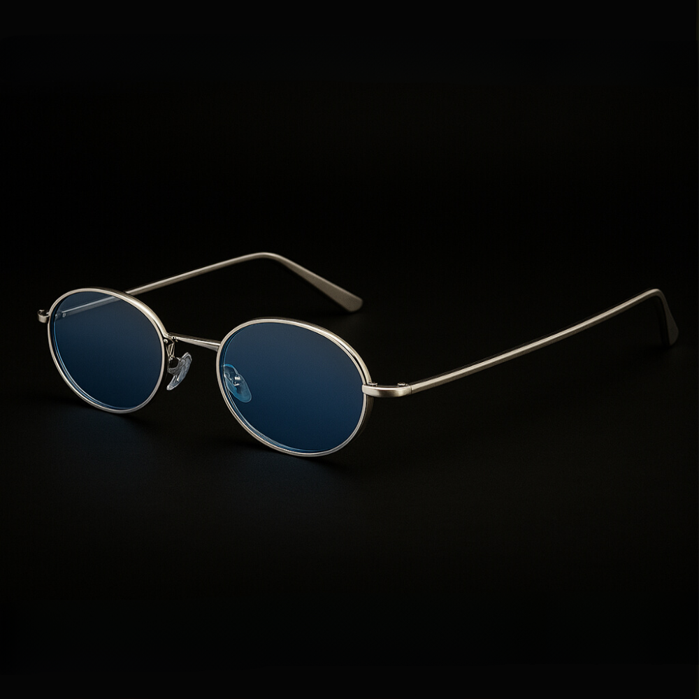 Orin Oval Frame Sunglasses with blue lenses and polished metallic finish, designed for style and comfort.