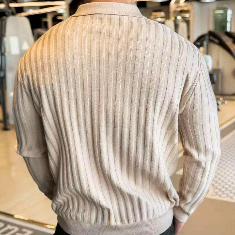 Back view of a men's ribbed zip polo shirt showcasing muscle-shaping texture and structured collar design.