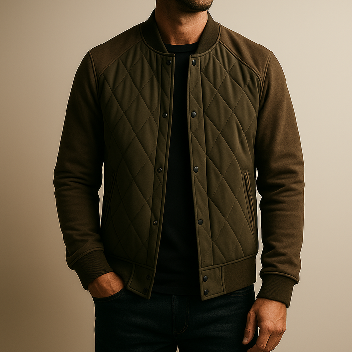 Man wearing a brown quilted jacket against a beige background