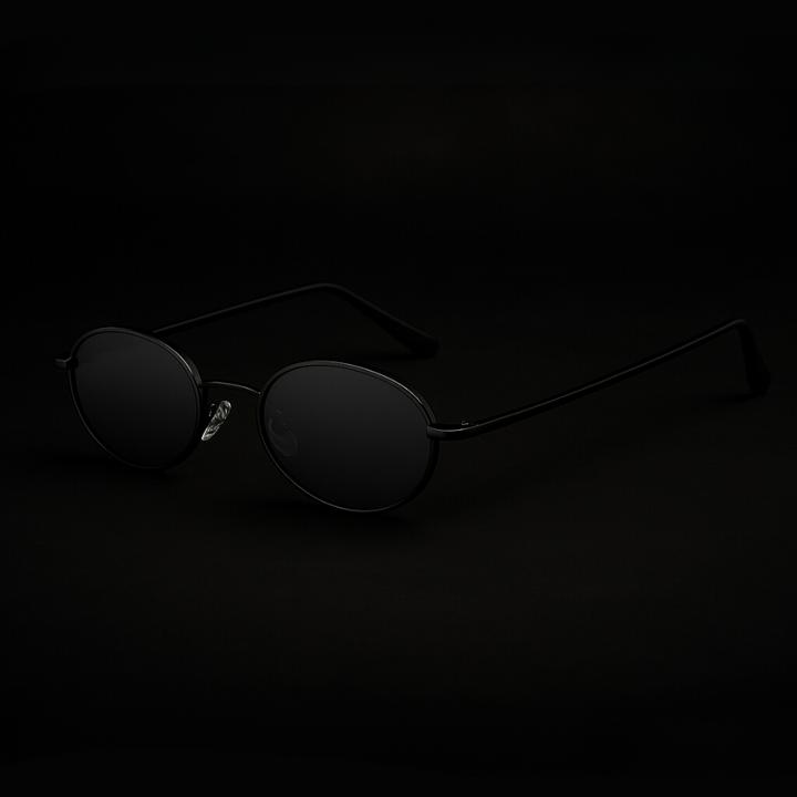 Orin Oval Frame Sunglasses with polished metallic finish, scratch-resistant lenses, and UV400 sun protection.