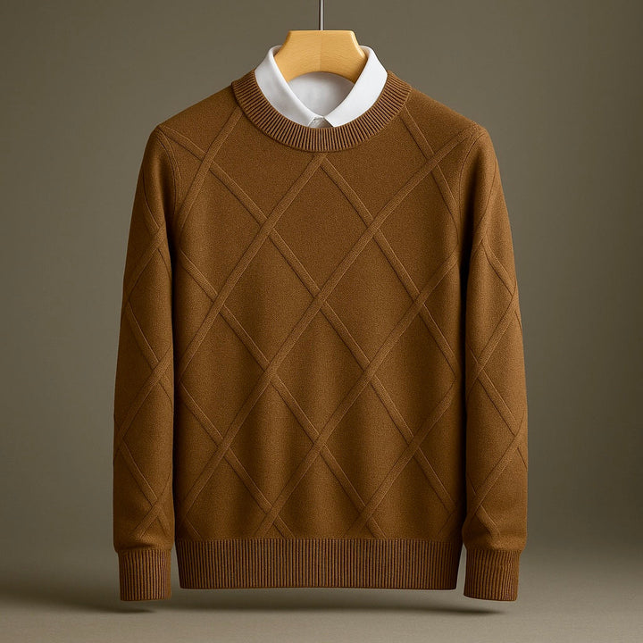 Brown sweater with a diamond pattern on a hanger against a brown background