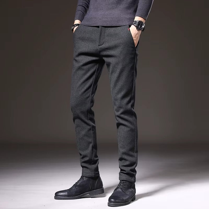 Henderson Slim-Fit Pants in dark color, showcasing a tailored fit with pockets and sleek style, perfect for modern occasions.