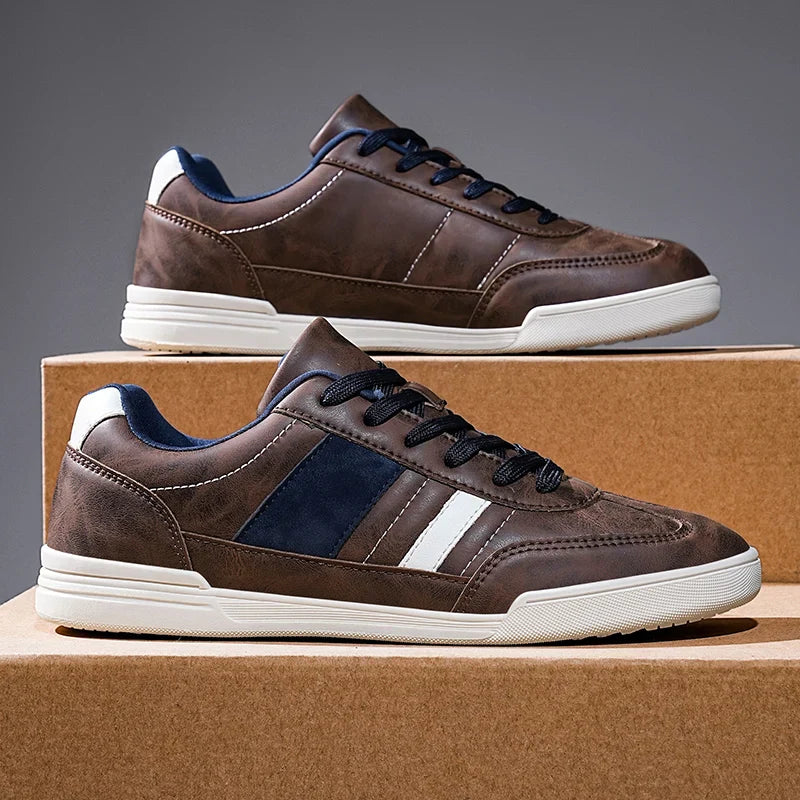 Rival Sport Sneakers featuring bold retro design, contrast paneling, and low-profile silhouette on display.