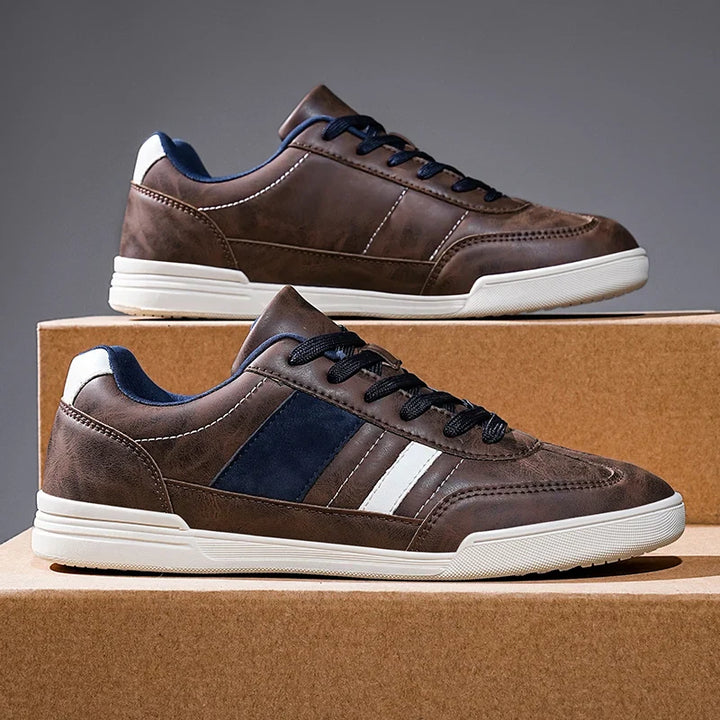 Rival Sport Sneakers featuring bold retro design, contrast paneling, and low-profile silhouette on display.
