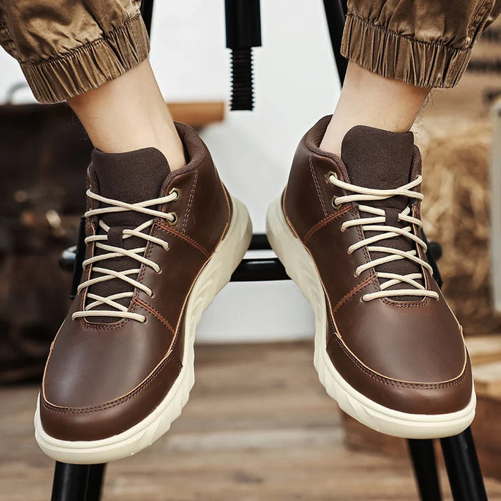 Summit Leather Mid-Tops in brown, showcasing a cushioned sole and lace-up design for durability and comfort.