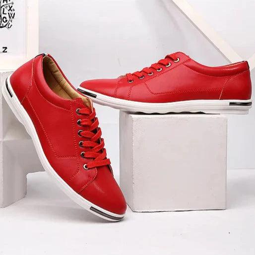 Paxton Low-Top Comfort Sneakers in red with soft leather upper and hidden lacing for a sleek, polished look.