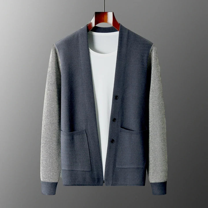 Rowan Merino Cardigan in navy and gray, featuring ribbed sleeves and button front design, perfect for versatile layering.