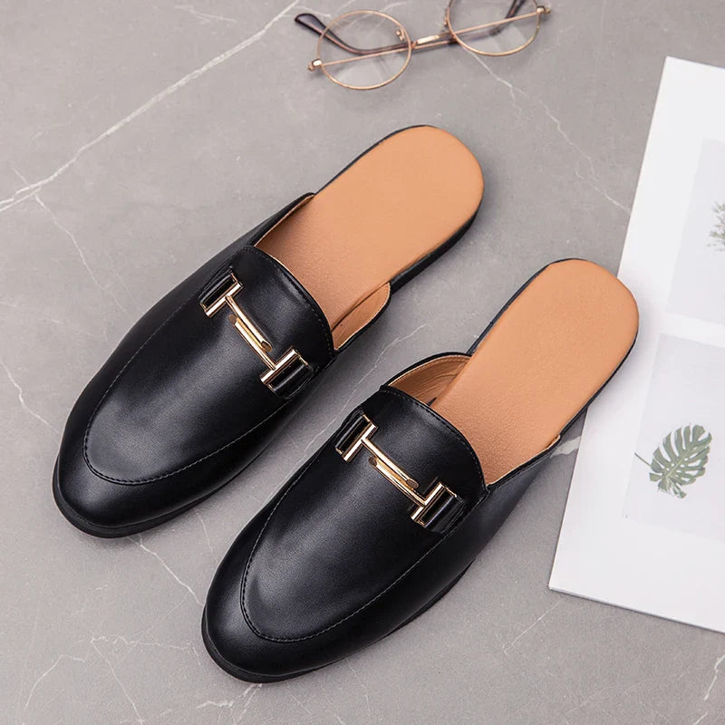 Santino Backless Slide Loafers in sleek black leather with gold bit hardware and open back design for effortless style.