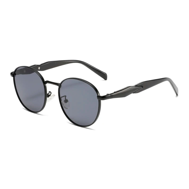 Bold round-frame black sunglasses with gray lenses and sleek design, offering full UV400 protection and comfort.