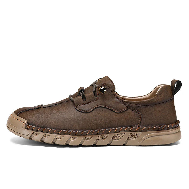 Vantage genuine leather shoes in brown with flexible rubber sole and hand-stitched detailing for refined comfort.