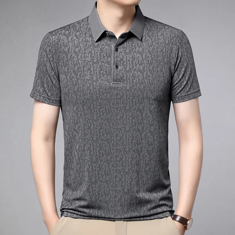 Auren Men's Jacquard Polo Shirt in grey, featuring a textured design, structured collar, and breathable fabric for all-day comfort.