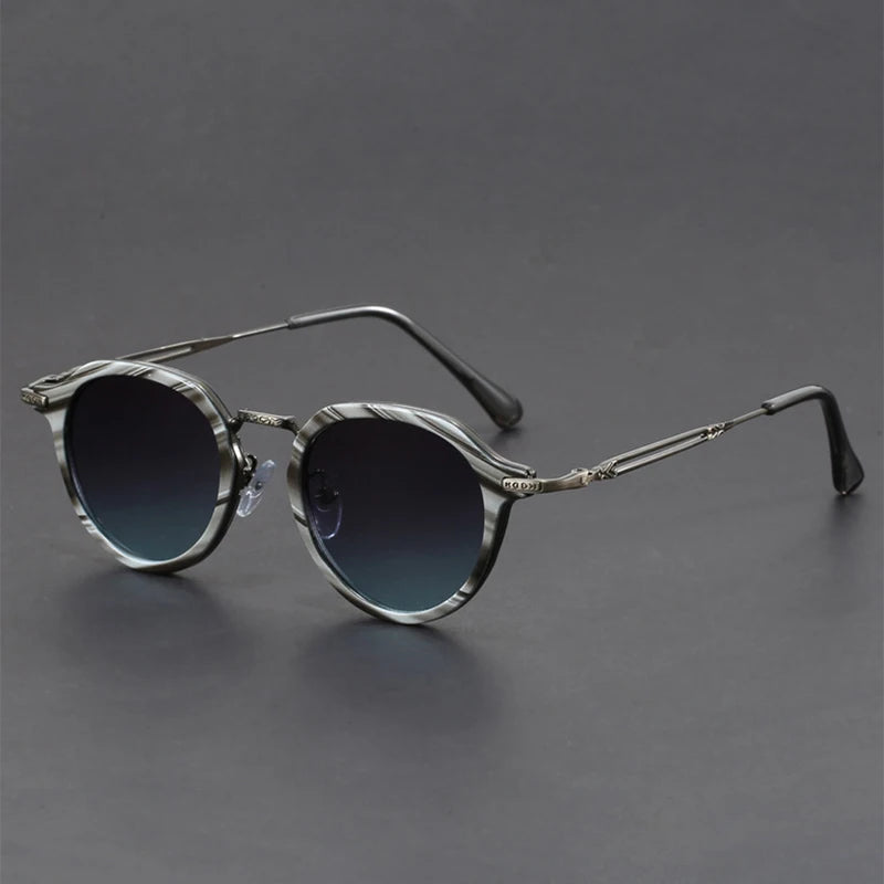 Vista Retro Shades with round textured metal frame and UV400 lenses for stylish sun protection.