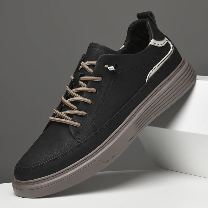 Genesis Leather Sneakers in black, featuring genuine leather, cushioned interior, and durable rubber sole for style and comfort.