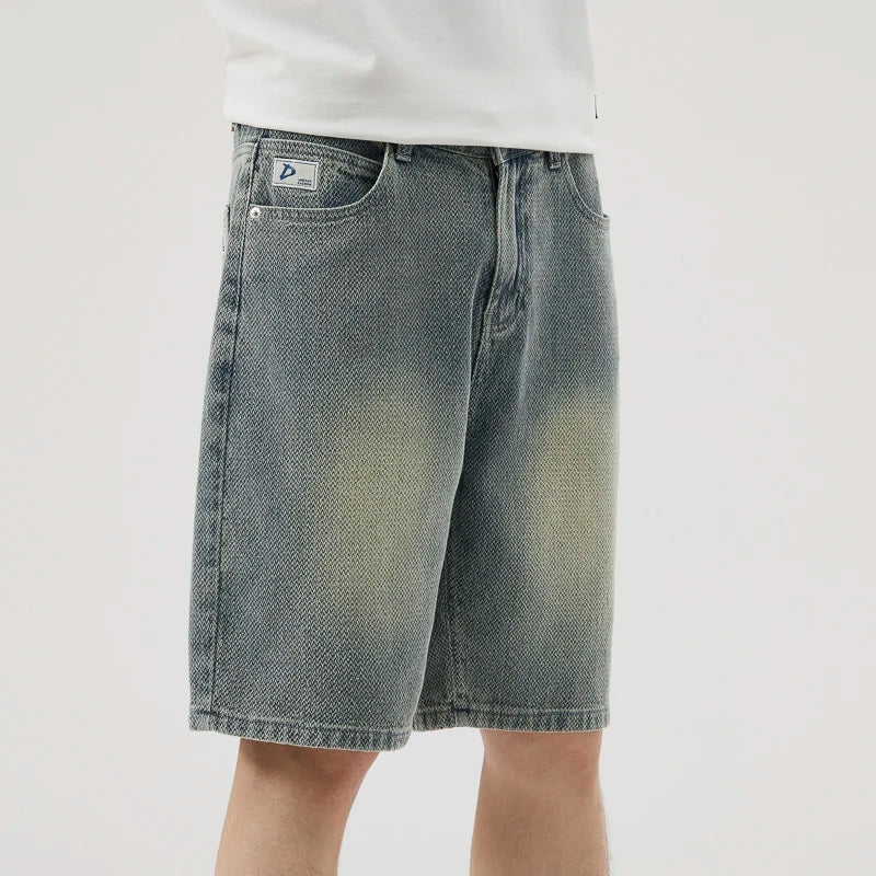 Men's Axel Faded Wash Denim Shorts featuring unique crosshatch weave and mid-length cut for a stylish streetwear look.
