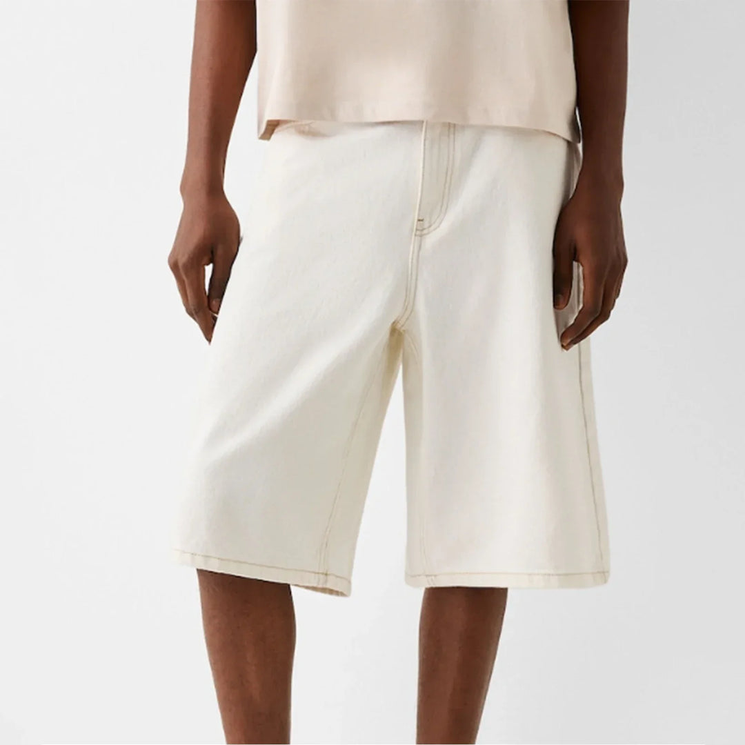 Kai Men's Straight Denim Shorts in cream color, featuring a structured knee-length design and a relaxed fit for comfort.