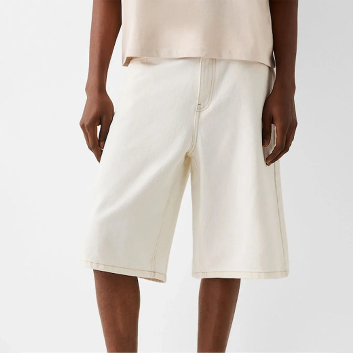 Kai Men's Straight Denim Shorts in cream color, featuring a structured knee-length design and a relaxed fit for comfort.