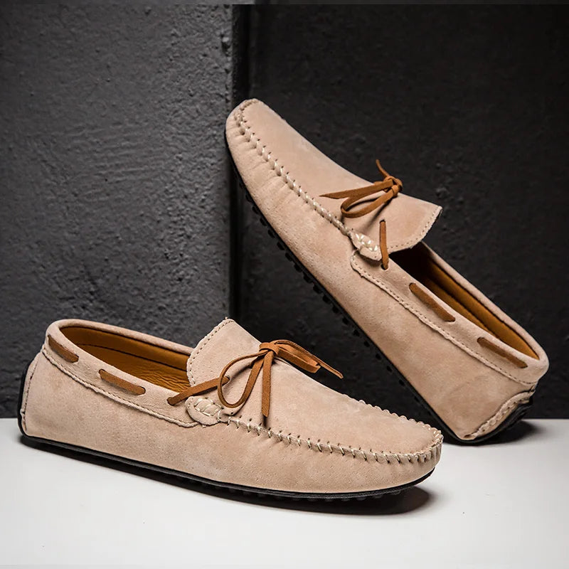 Monte Carlo genuine suede loafers featuring hand-stitched details and premium leather laces for comfort and style.