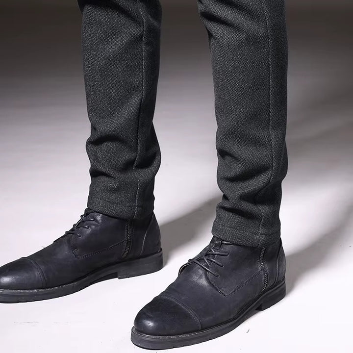 Henderson Slim-Fit Pants showcased with black boots, featuring a modern fit in a soft cotton-bamboo blend for comfort.