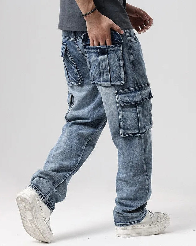 Ryder washed cargo jeans featuring oversized pockets and a relaxed wide-leg fit, perfect for a stylish casual look.