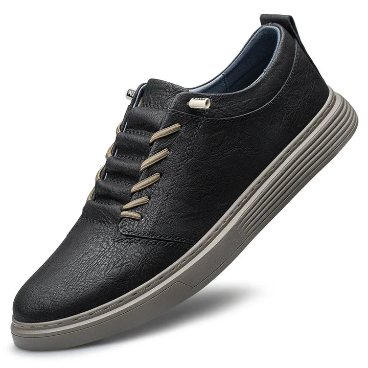 Ashton Genuine Leather Sneakers in black with precision stitching and cloud-like cushioning for ultimate comfort.