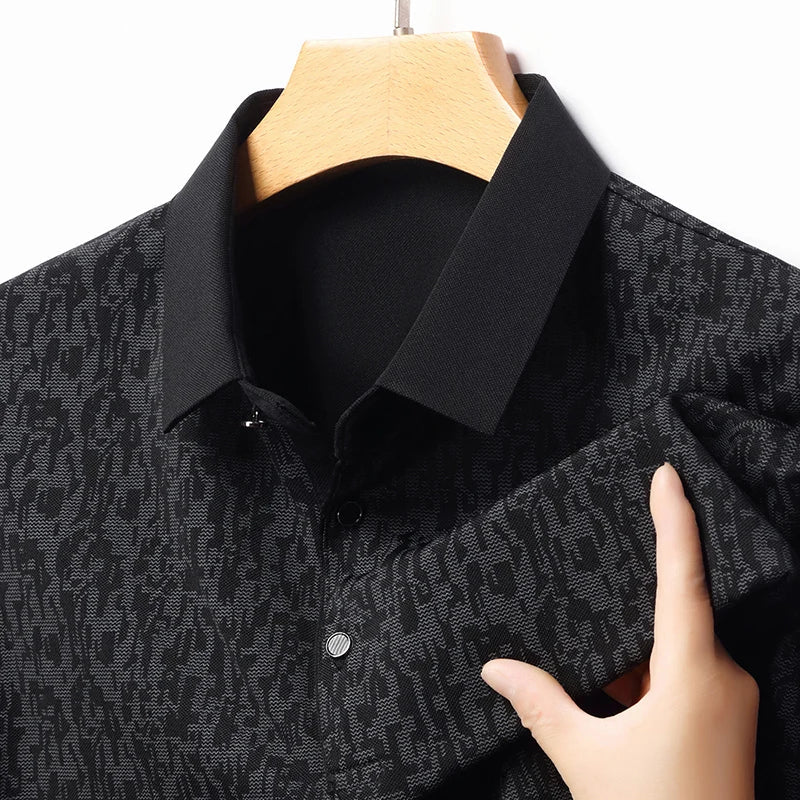 Auren Men's Jacquard Polo Shirt showcasing a textured black design and structured ribbed collar for comfort and style.