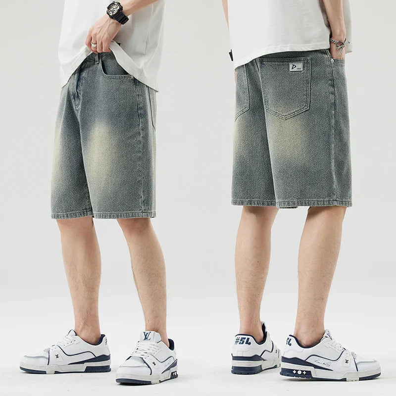 Men’s Axel Faded Wash Denim Shorts featuring a unique crosshatch weave and relaxed straight-leg cut.