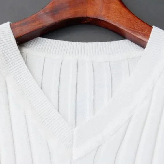 Close-up of Evren Men's Ribbed V-Neck Tee neckline showing sleek ribbed texture and modern v-neck design.