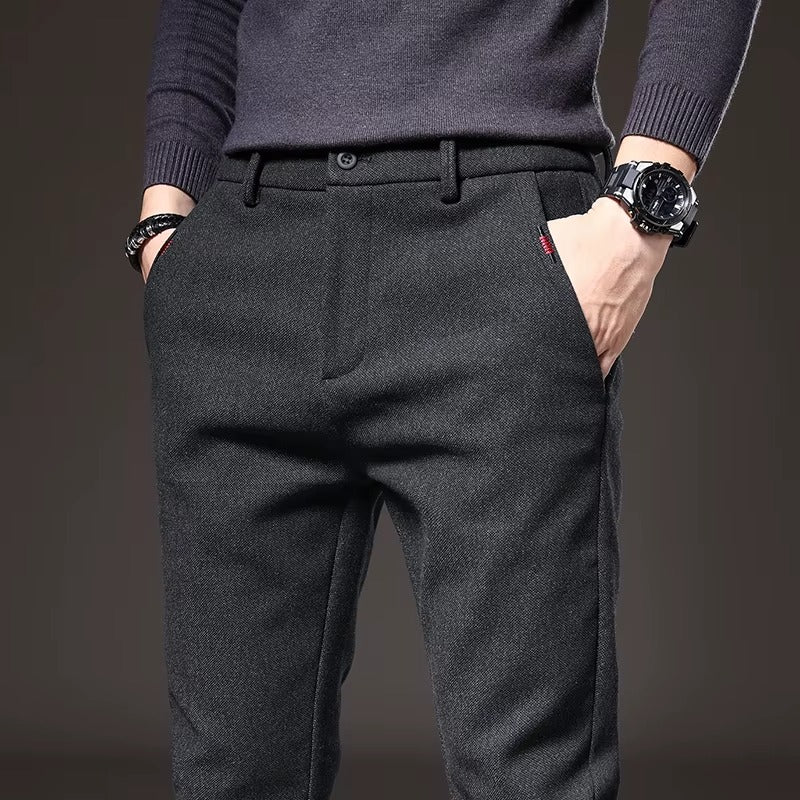 Close-up of Henderson Slim-Fit Pants in dark fabric, showcasing a tailored fit and stylish design, ideal for versatile occasions.