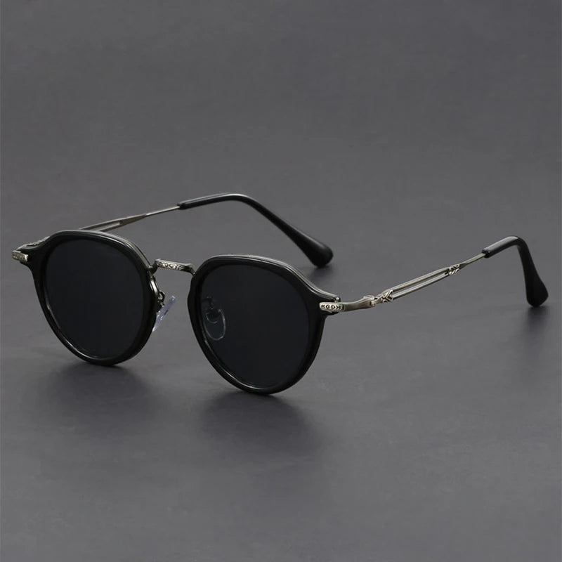Vista Retro Shades with textured metal frame and UV400 lenses for sun protection, featuring a unique round design.