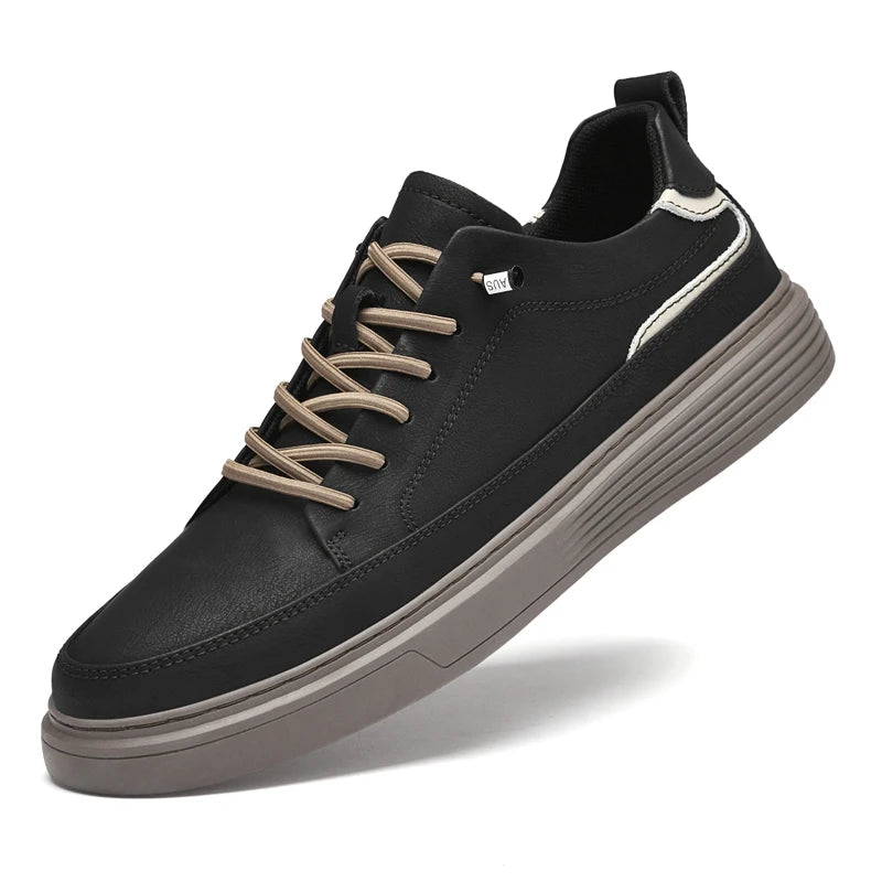 Genesis Leather Sneakers in black with lace-up design, featuring a cushioned interior and durable rubber sole.