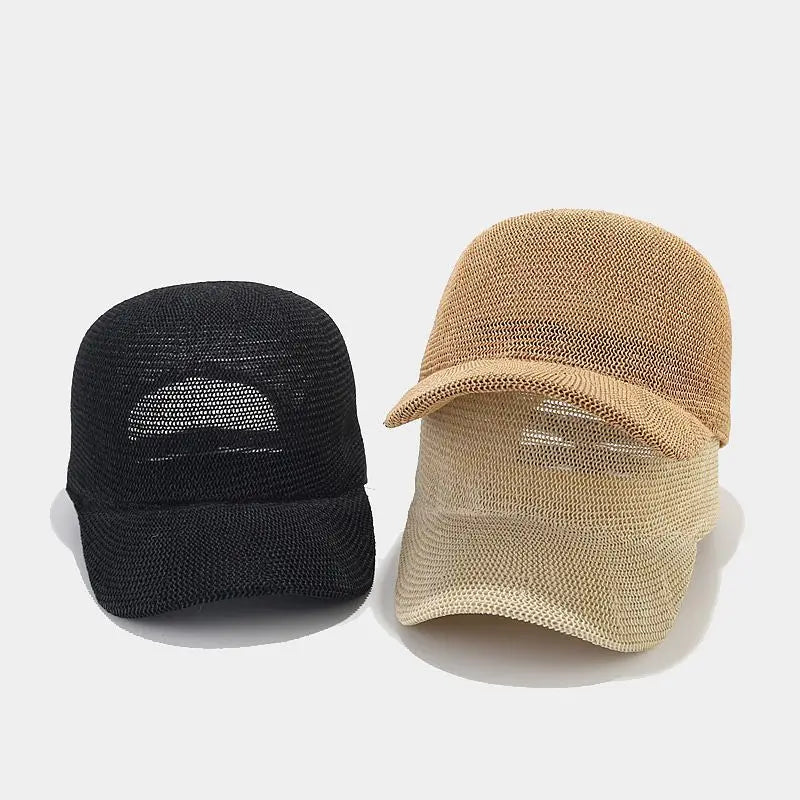 Bayfield Sun Cap in black and beige, featuring breathable woven material and a stylish curved brim for sun protection.
