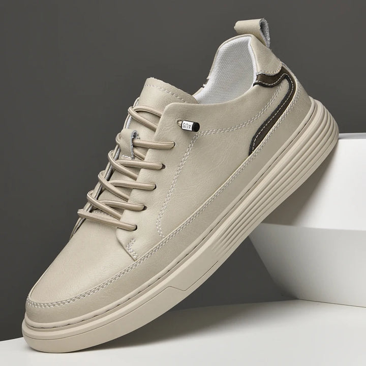 Genesis Leather Sneakers in beige with lace-up design, cushioned interior, and durable rubber sole for style and comfort.