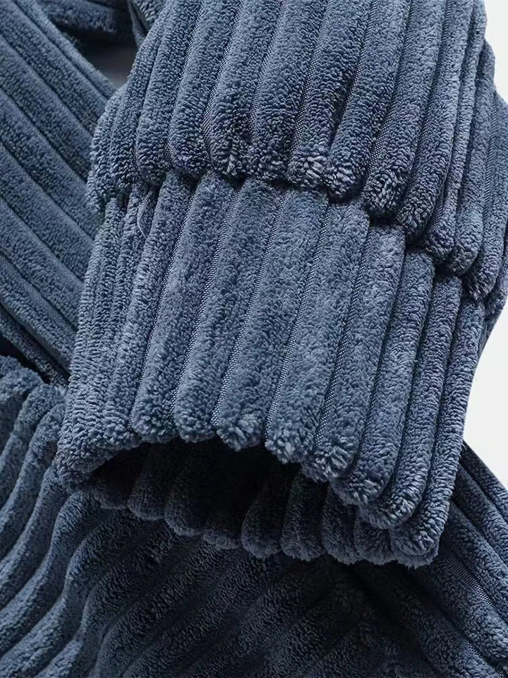 Close-up of Summit Corduroy Hoodie showcasing the premium ribbed texture and ultra-soft fabric in a rich navy color.