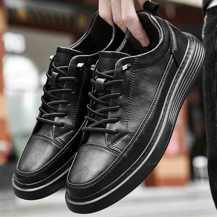 Aristo Oxford Shoes: Black genuine leather sneakers with sleek low-top design and bold contrast laces.
