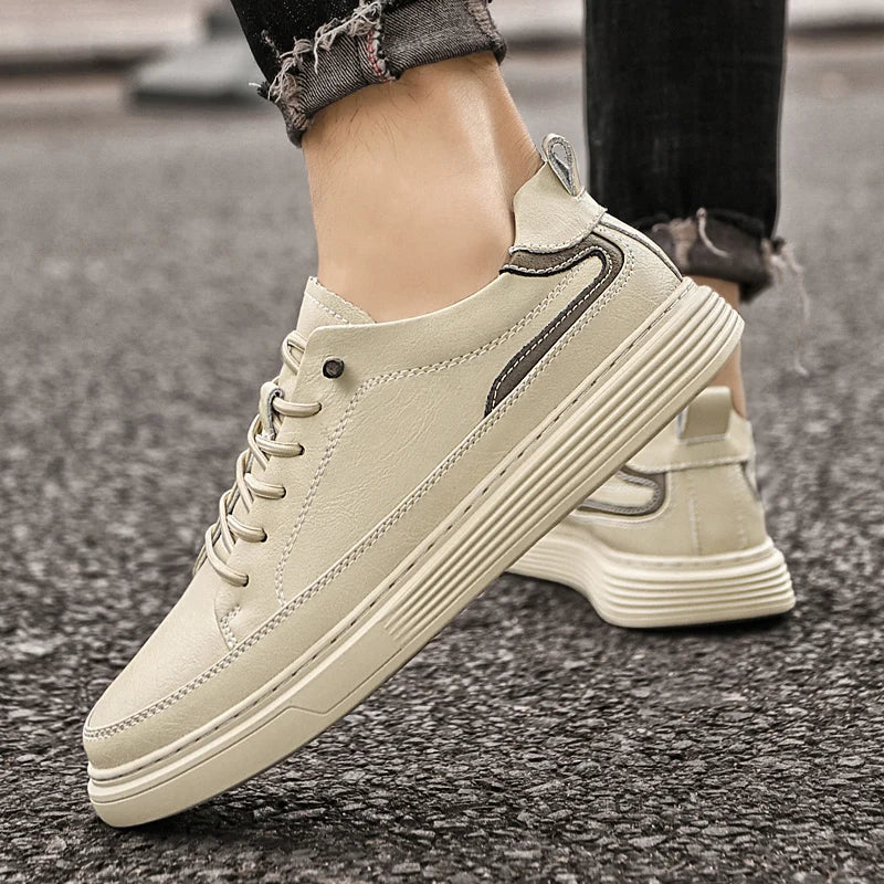 Genesis Leather Sneakers in beige with cushioned interior and durable rubber sole for style and comfort.