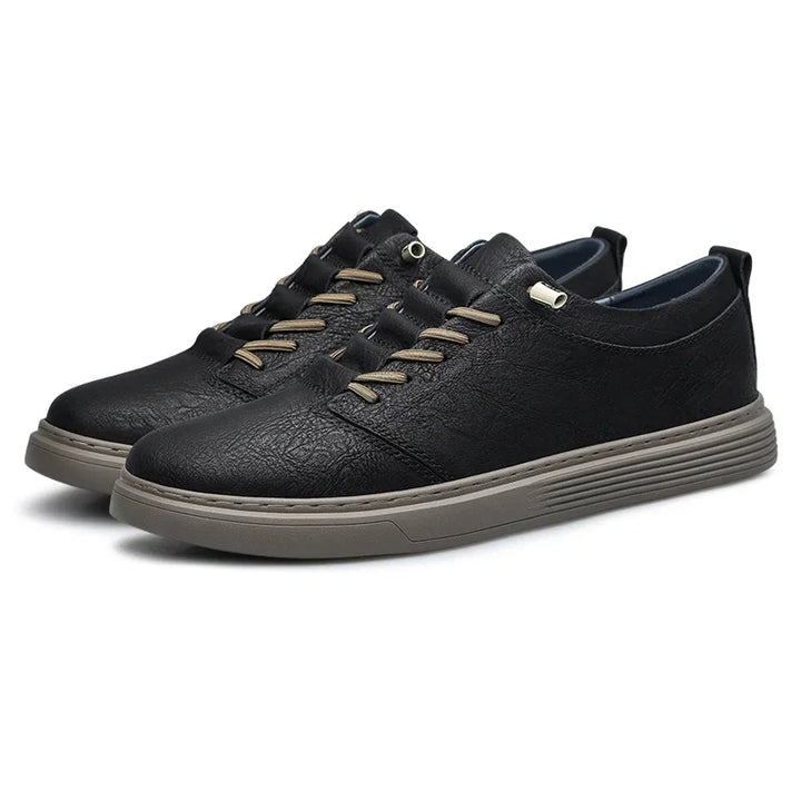 Ashton Genuine Leather Sneakers featuring supple leather, precision stitching, and cloud-like cushioning for ultimate comfort.