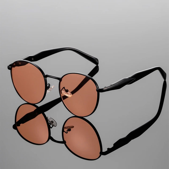 Bellano Sunglasses: bold round-frame design with polished metal accents and UV400 protection, ideal for stylish retro vibes.