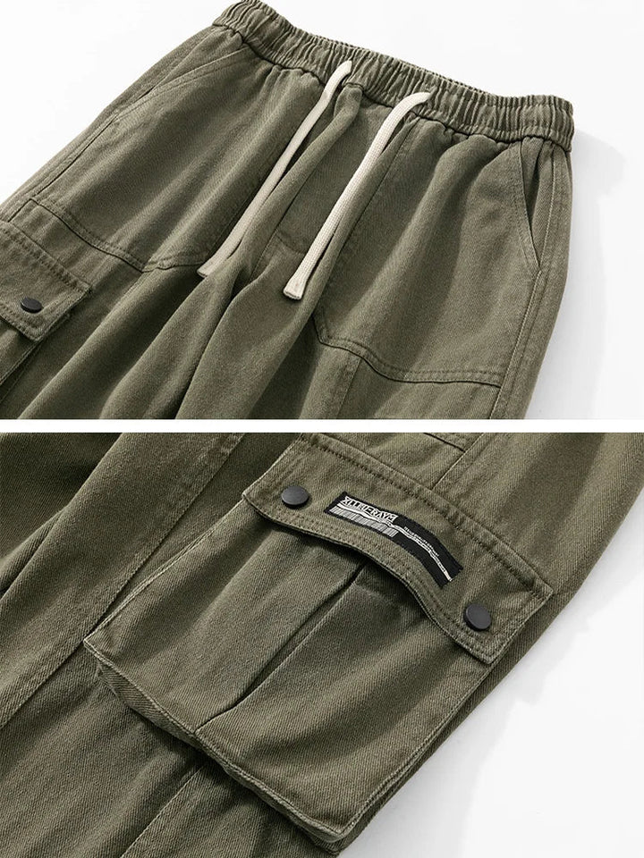 Lennox Cargo Joggers in olive green, featuring adjustable drawstring, oversized pockets, and elastic cuffs for a relaxed fit.